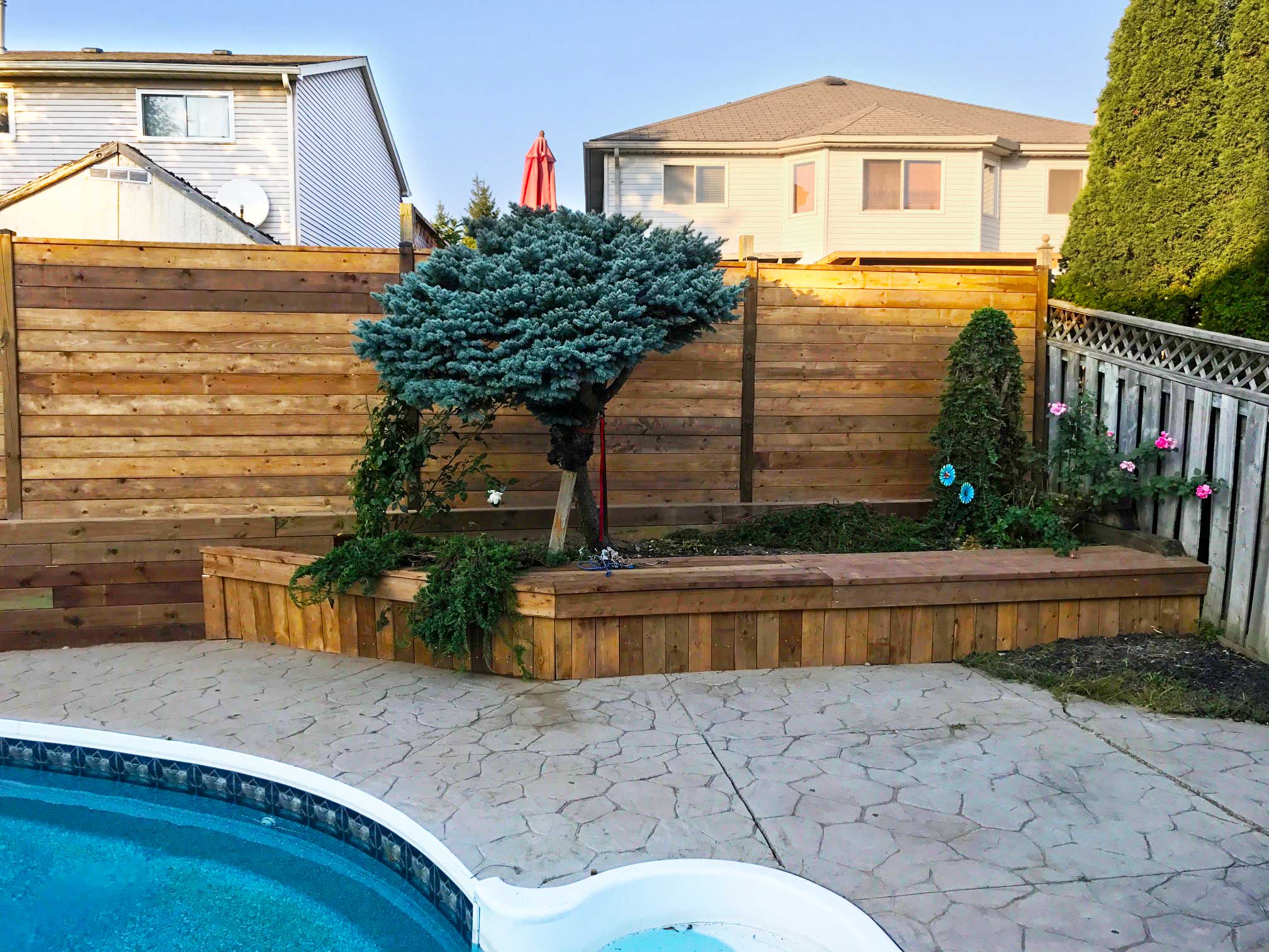Wood pool fence installation